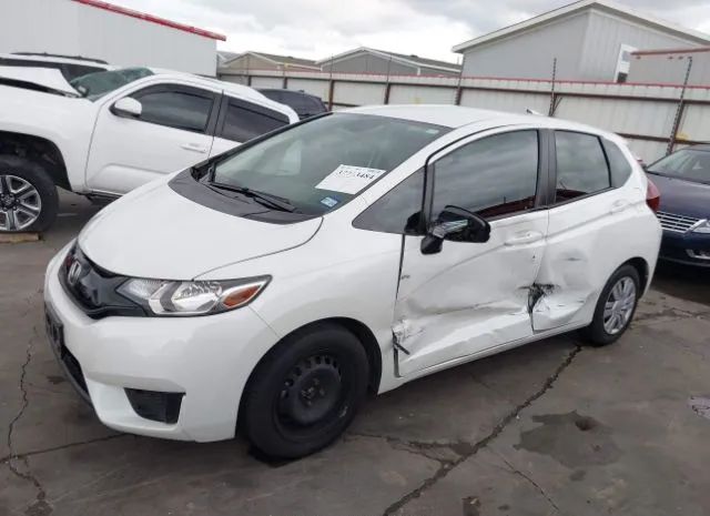 Photo 5 VIN: JHMGK5H55GS006945 - HONDA FIT 