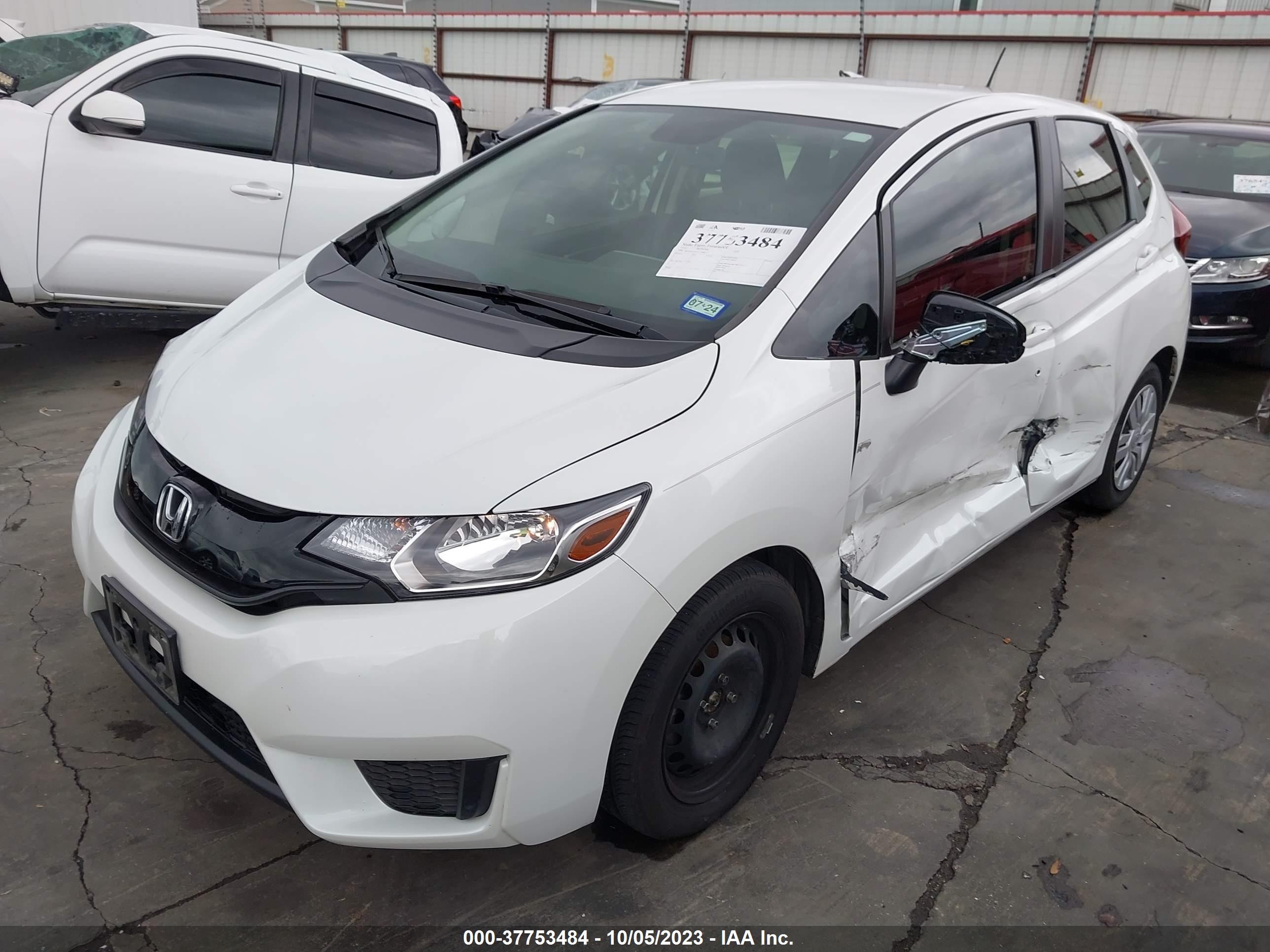 Photo 1 VIN: JHMGK5H55GS006945 - HONDA FIT 