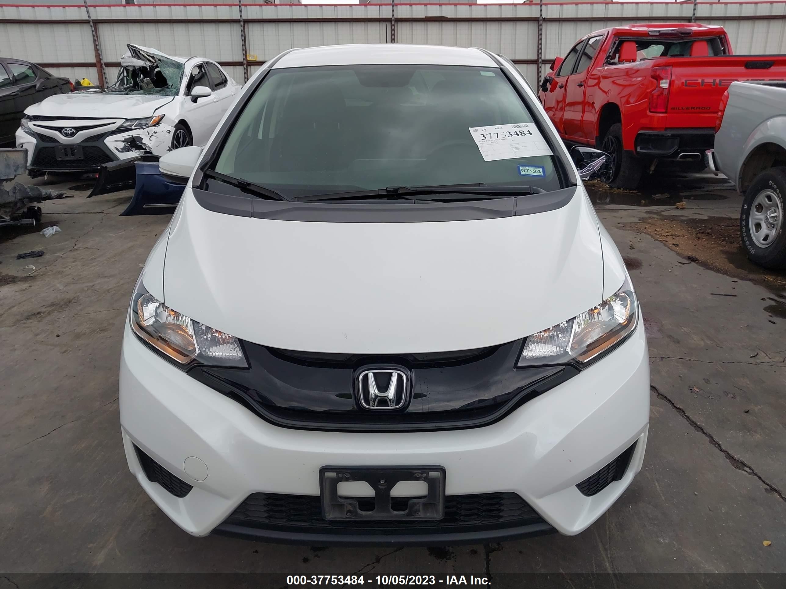 Photo 12 VIN: JHMGK5H55GS006945 - HONDA FIT 