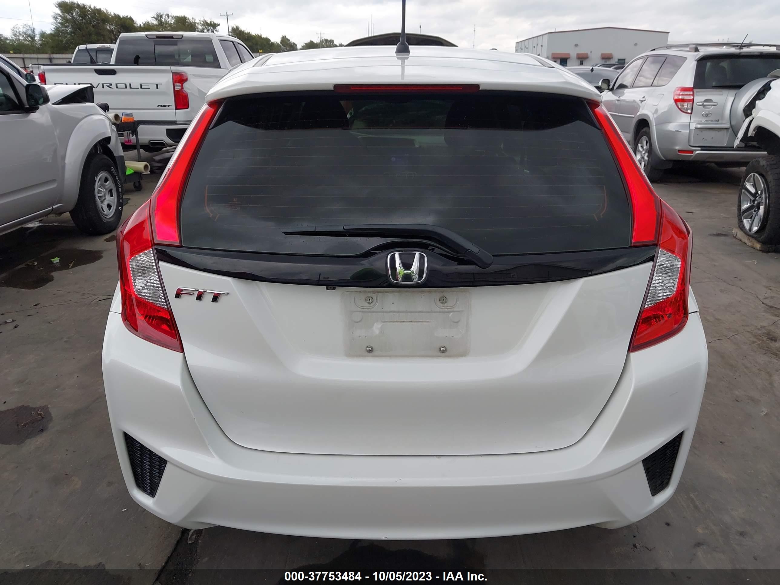 Photo 16 VIN: JHMGK5H55GS006945 - HONDA FIT 