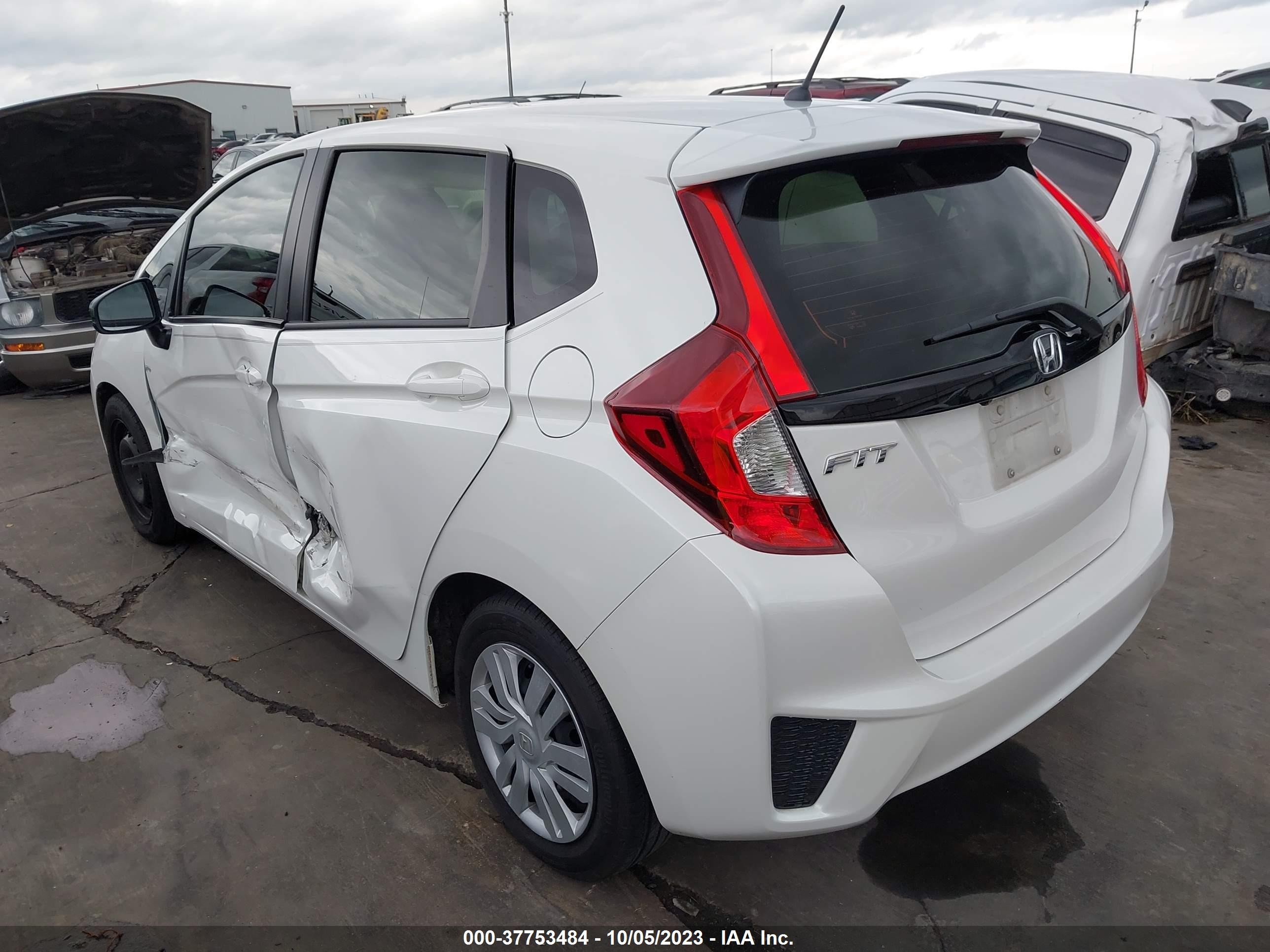 Photo 2 VIN: JHMGK5H55GS006945 - HONDA FIT 