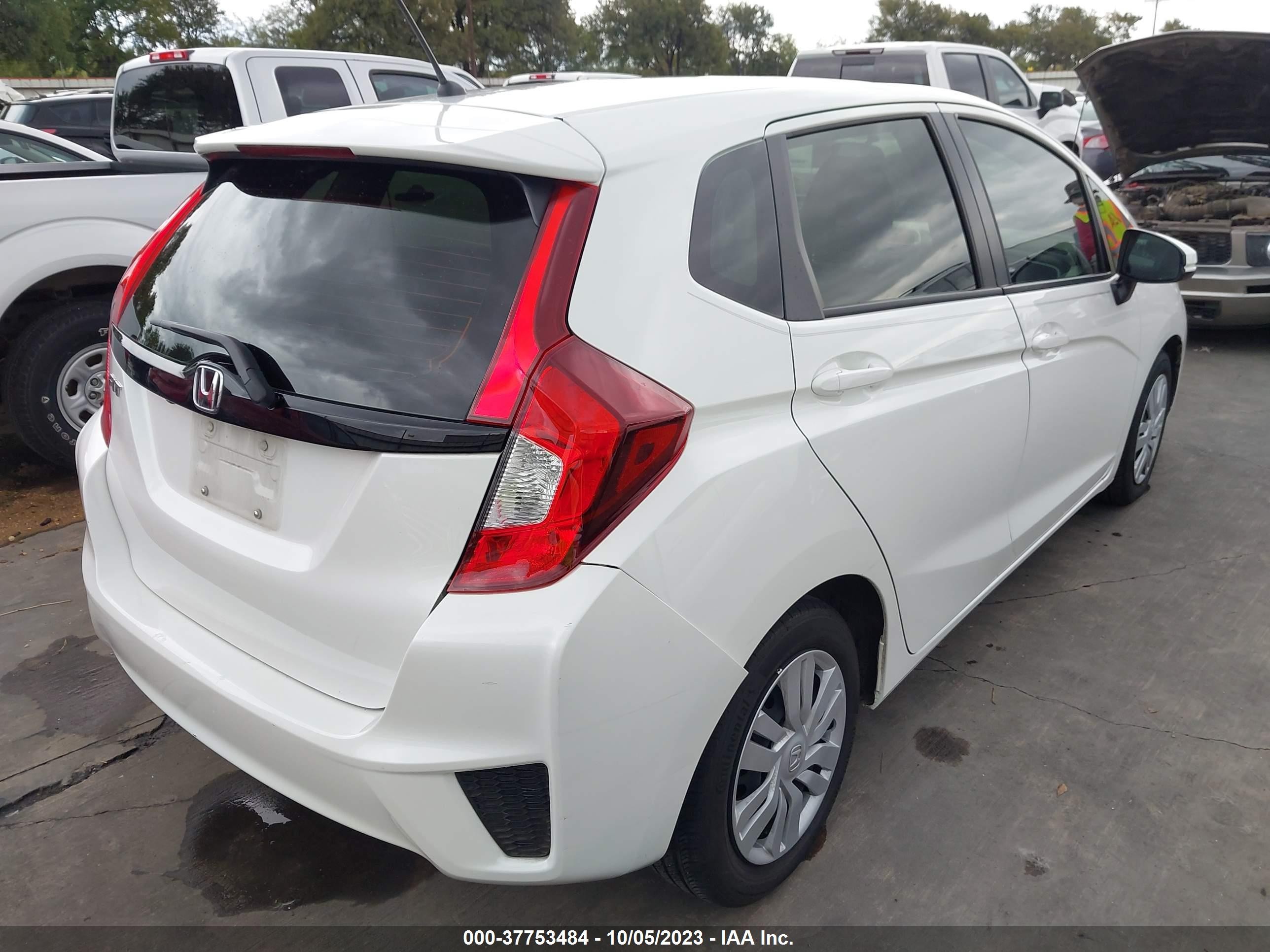 Photo 3 VIN: JHMGK5H55GS006945 - HONDA FIT 