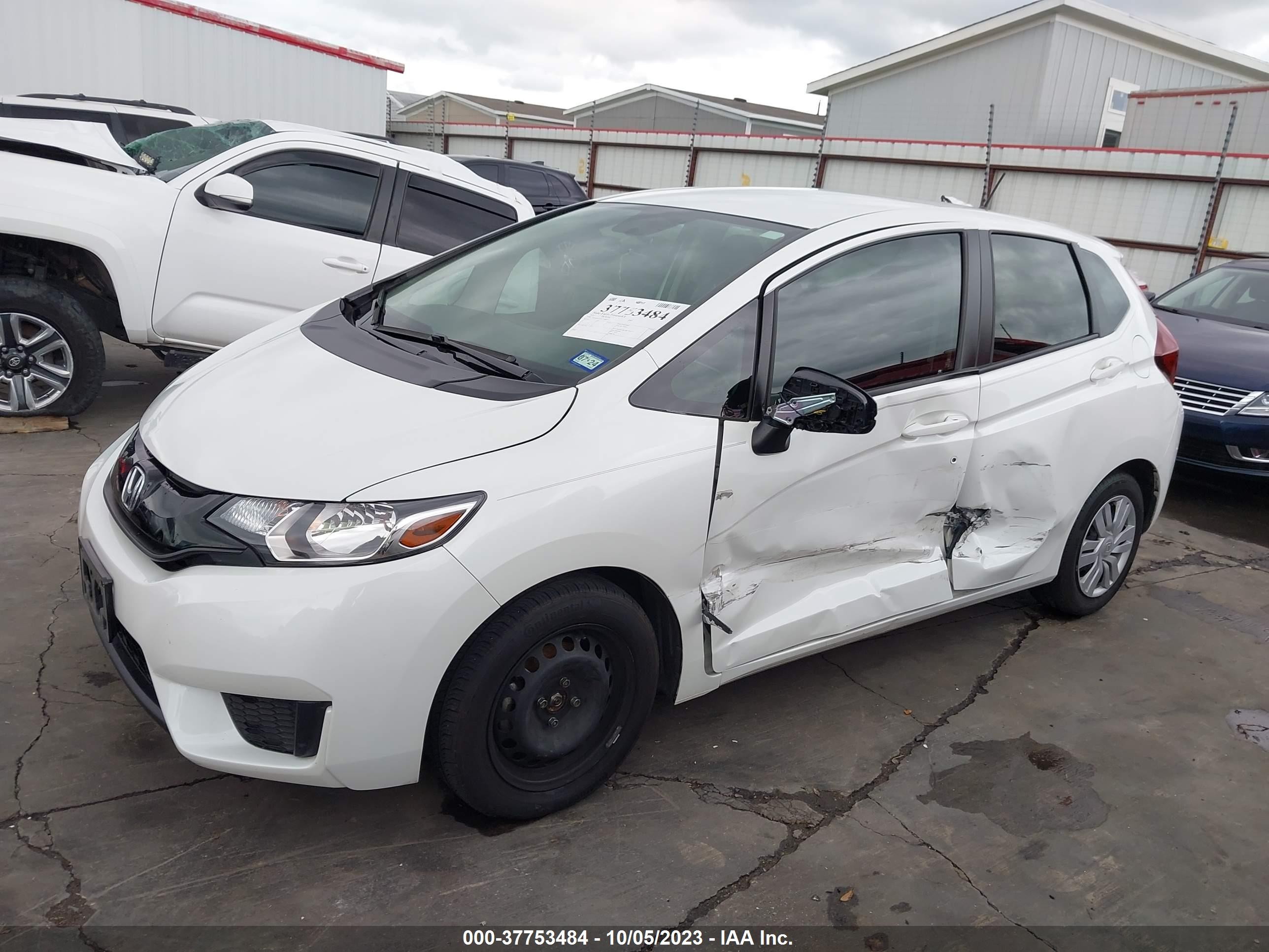 Photo 5 VIN: JHMGK5H55GS006945 - HONDA FIT 