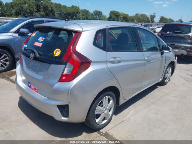 Photo 3 VIN: JHMGK5H55GS010722 - HONDA FIT 