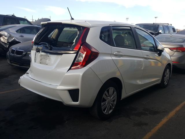 Photo 3 VIN: JHMGK5H55GX002641 - HONDA FIT LX 