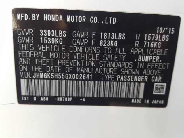 Photo 9 VIN: JHMGK5H55GX002641 - HONDA FIT LX 