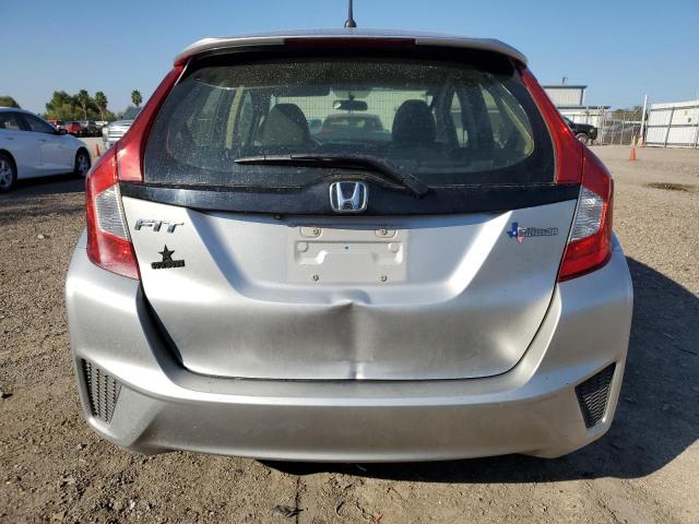 Photo 5 VIN: JHMGK5H55GX002994 - HONDA FIT LX 