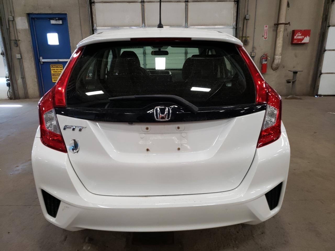 Photo 5 VIN: JHMGK5H55GX008388 - HONDA FIT 