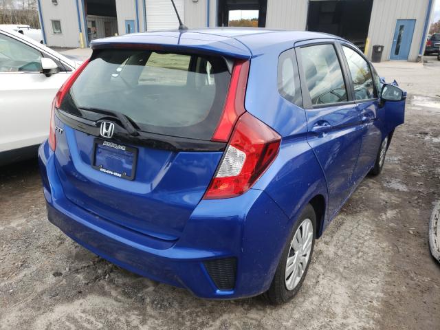 Photo 3 VIN: JHMGK5H55GX028883 - HONDA FIT LX 