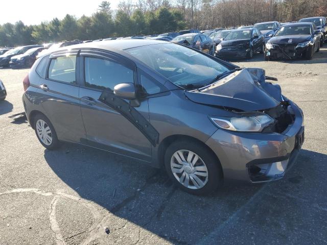 Photo 3 VIN: JHMGK5H55GX030374 - HONDA FIT LX 