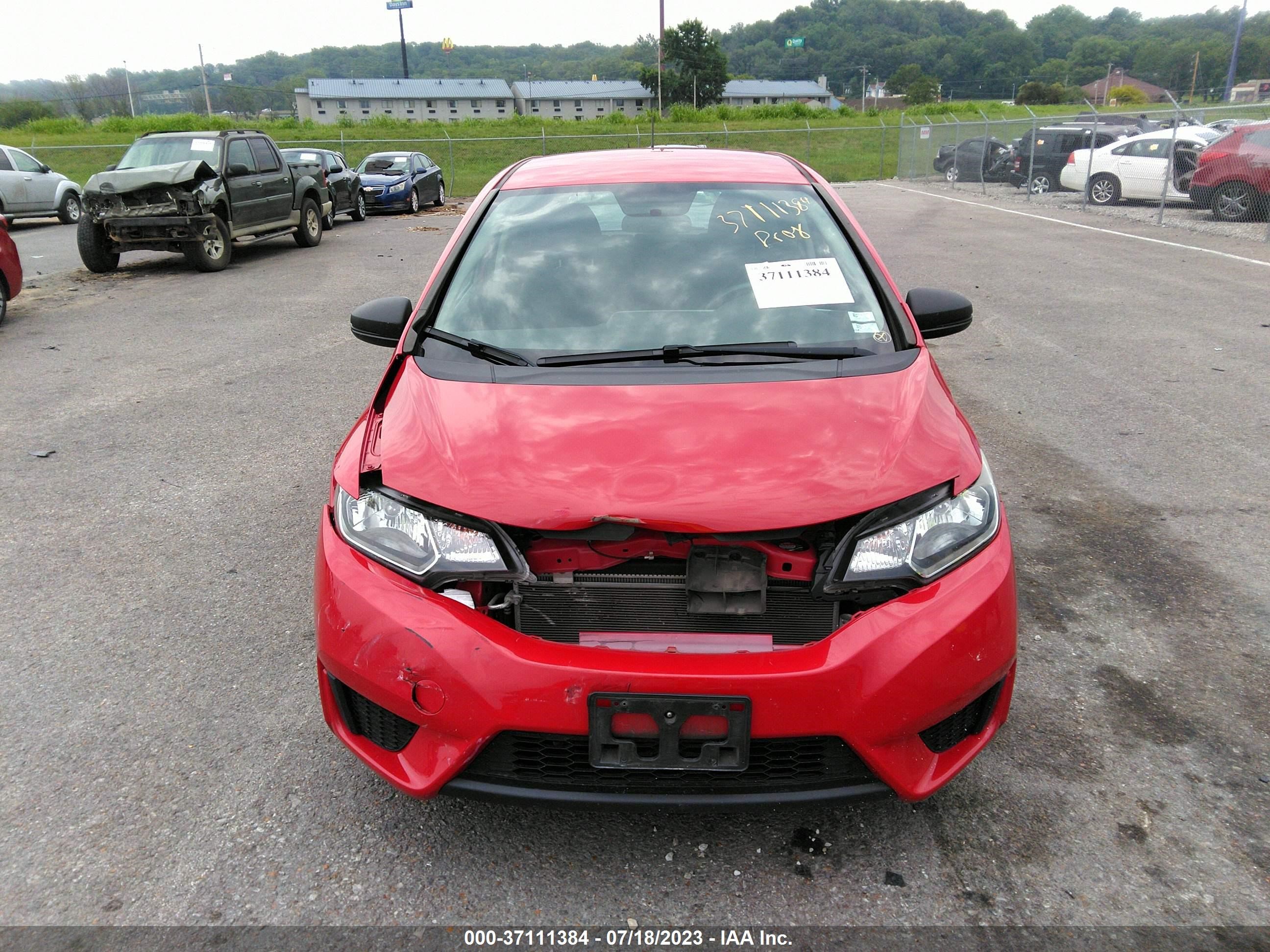 Photo 11 VIN: JHMGK5H55GX037972 - HONDA FIT 