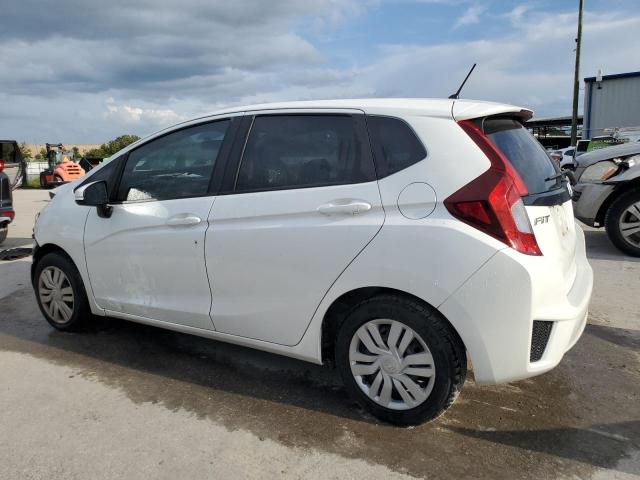 Photo 1 VIN: JHMGK5H55GX040256 - HONDA FIT LX 