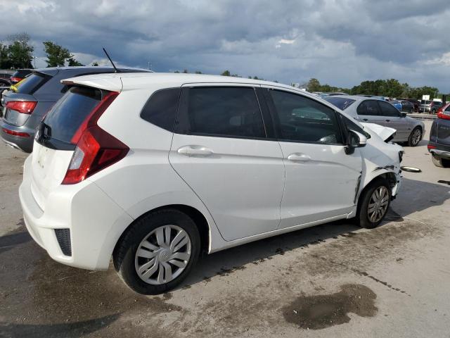 Photo 2 VIN: JHMGK5H55GX040256 - HONDA FIT LX 