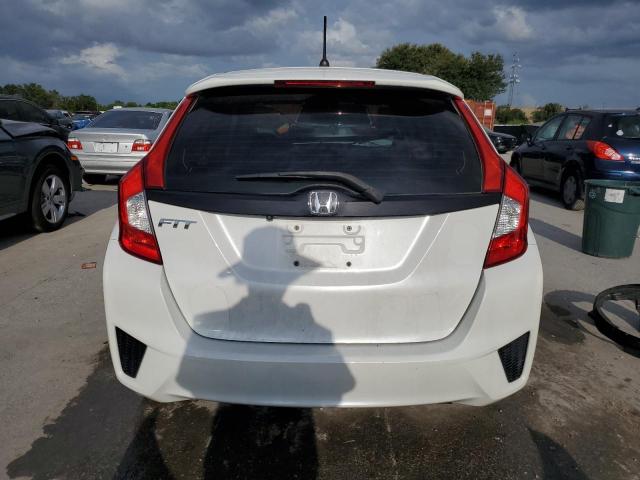 Photo 5 VIN: JHMGK5H55GX040256 - HONDA FIT LX 