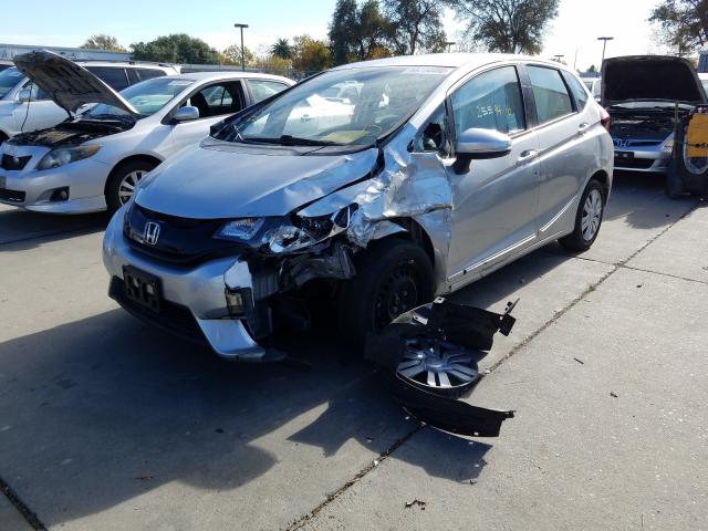 Photo 1 VIN: JHMGK5H55GX040922 - HONDA FIT LX 