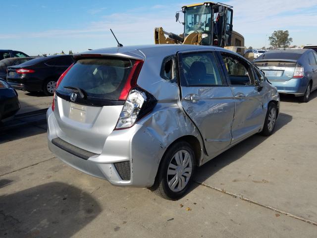 Photo 3 VIN: JHMGK5H55GX040922 - HONDA FIT LX 