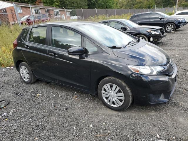 Photo 3 VIN: JHMGK5H56GX006214 - HONDA FIT LX 