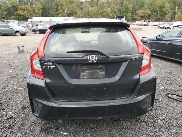 Photo 5 VIN: JHMGK5H56GX006214 - HONDA FIT LX 