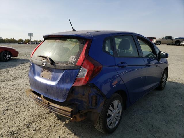 Photo 3 VIN: JHMGK5H56GX006794 - HONDA FIT LX 