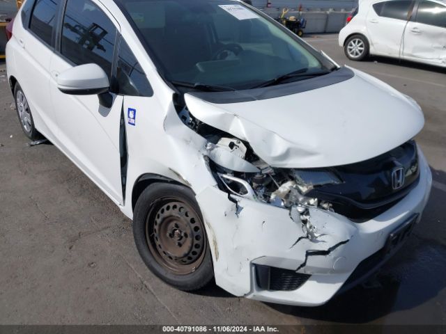 Photo 5 VIN: JHMGK5H56GX015866 - HONDA FIT 