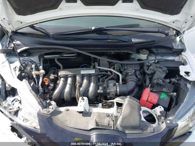 Photo 9 VIN: JHMGK5H56GX015866 - HONDA FIT 