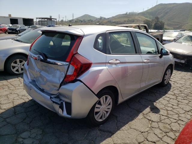 Photo 3 VIN: JHMGK5H56GX020596 - HONDA FIT LX 