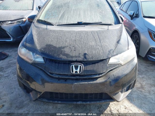 Photo 5 VIN: JHMGK5H56GX030089 - HONDA FIT 