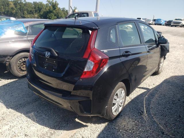 Photo 3 VIN: JHMGK5H56GX040489 - HONDA FIT LX 