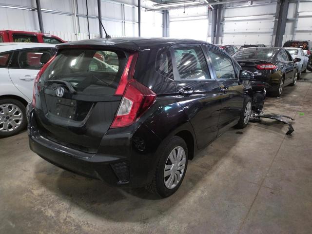 Photo 3 VIN: JHMGK5H56GX040511 - HONDA FIT LX 