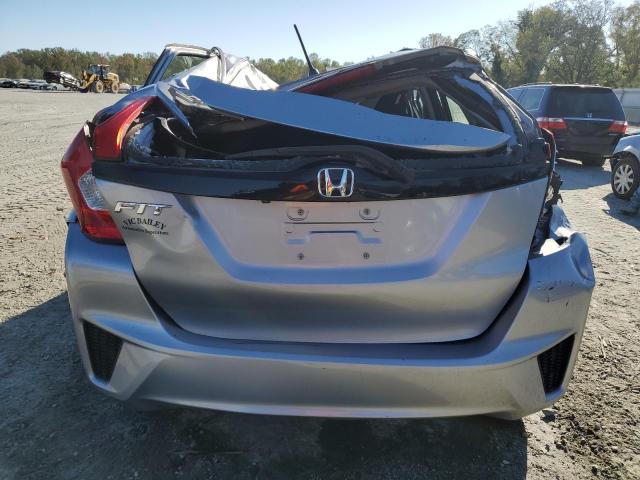 Photo 5 VIN: JHMGK5H56HS005613 - HONDA FIT LX 