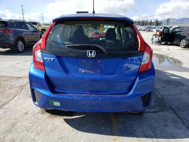 Photo 5 VIN: JHMGK5H57GS009829 - HONDA FIT LX 