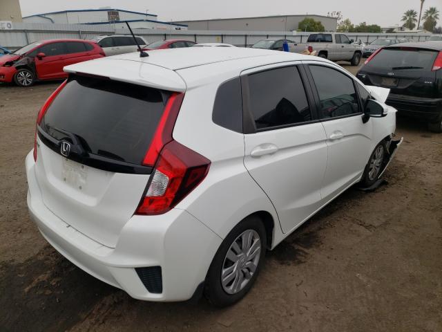 Photo 3 VIN: JHMGK5H57GX008375 - HONDA FIT LX 