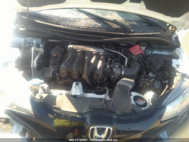 Photo 9 VIN: JHMGK5H57GX011440 - HONDA FIT 