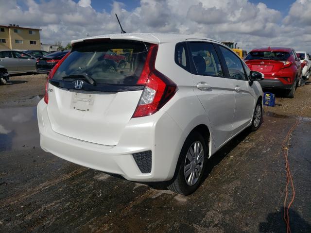 Photo 3 VIN: JHMGK5H57GX024916 - HONDA FIT LX 