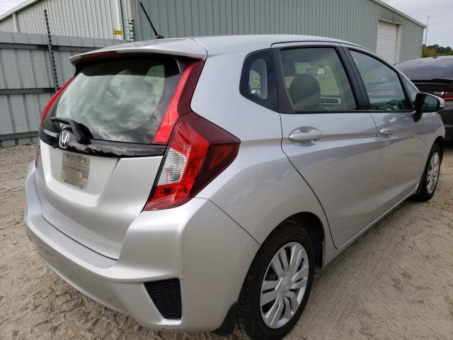 Photo 3 VIN: JHMGK5H58GS001772 - HONDA FIT LX 