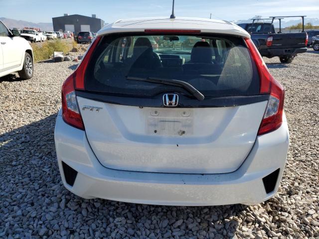 Photo 5 VIN: JHMGK5H58GS002677 - HONDA FIT LX 