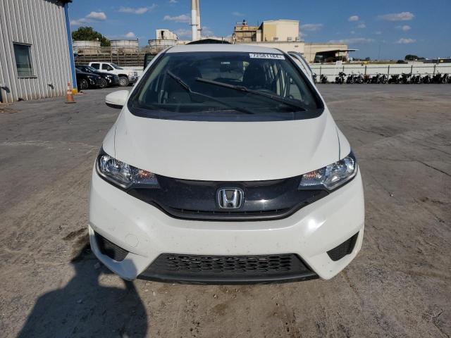 Photo 4 VIN: JHMGK5H58GS009810 - HONDA FIT LX 