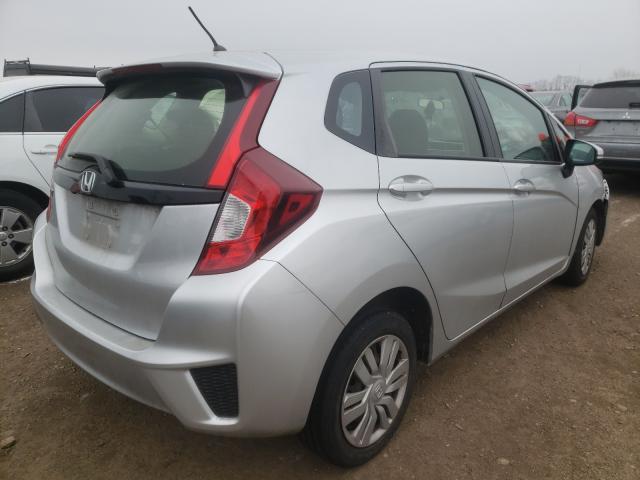 Photo 3 VIN: JHMGK5H58GX004187 - HONDA FIT LX 