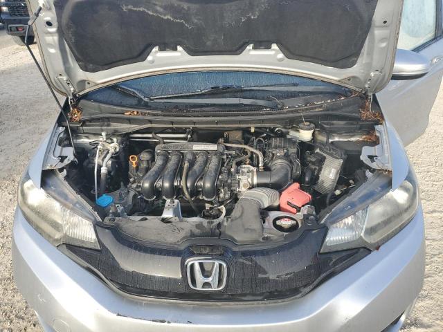 Photo 10 VIN: JHMGK5H58GX006991 - HONDA FIT LX 