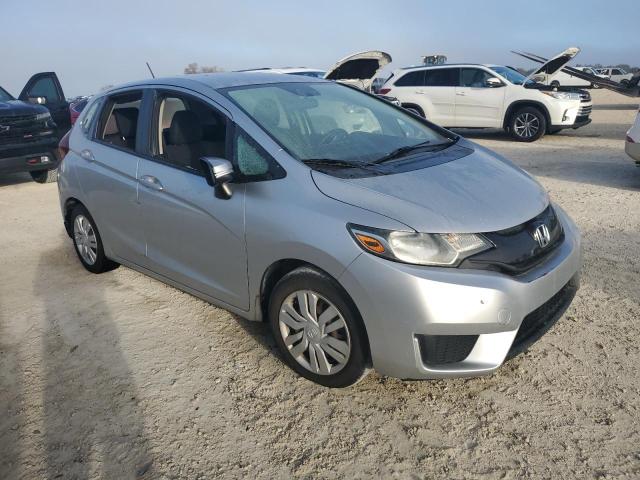 Photo 3 VIN: JHMGK5H58GX006991 - HONDA FIT LX 