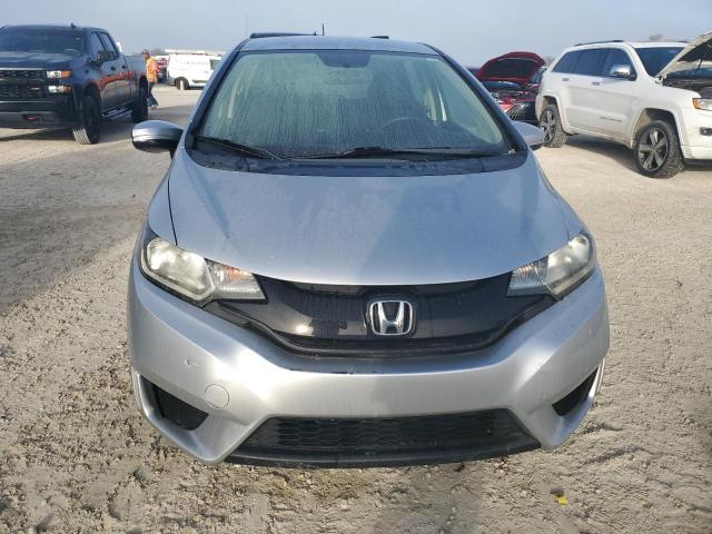 Photo 4 VIN: JHMGK5H58GX006991 - HONDA FIT LX 