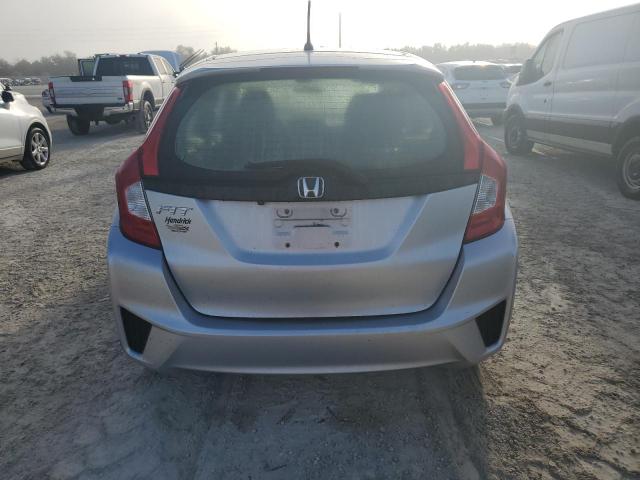 Photo 5 VIN: JHMGK5H58GX006991 - HONDA FIT LX 