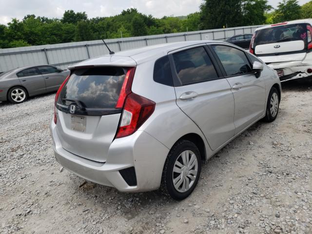 Photo 3 VIN: JHMGK5H58GX023435 - HONDA FIT LX 