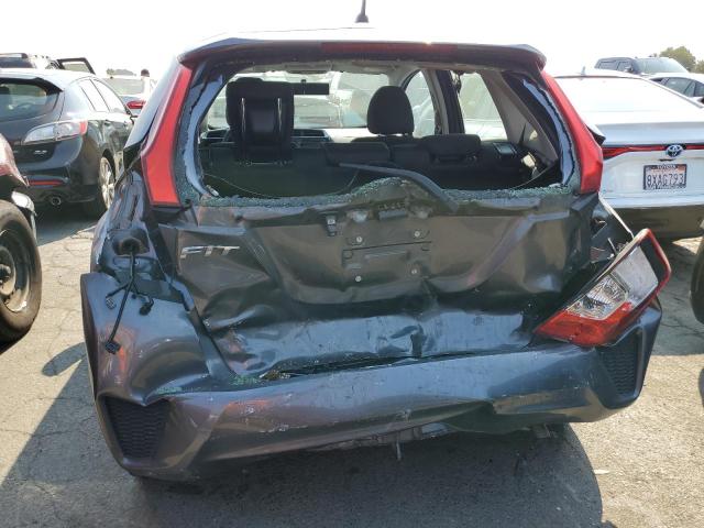 Photo 5 VIN: JHMGK5H59GS007502 - HONDA FIT LX 