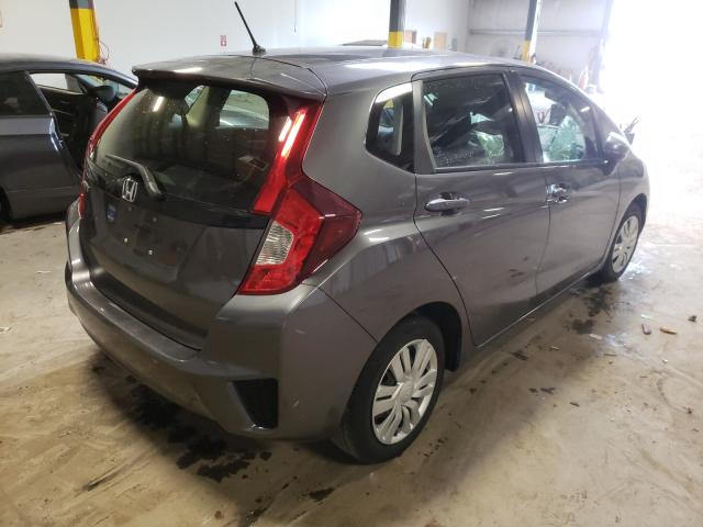 Photo 3 VIN: JHMGK5H59GS007855 - HONDA FIT LX 