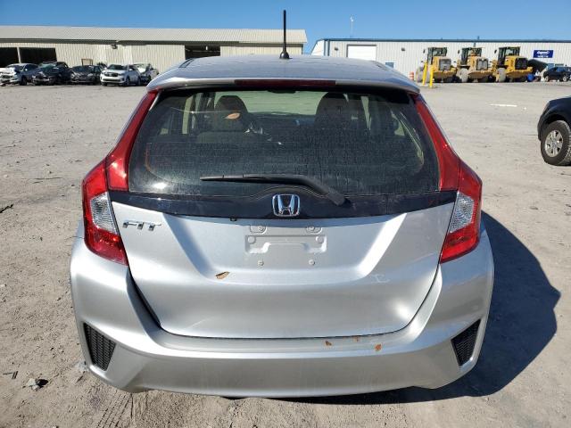 Photo 5 VIN: JHMGK5H59GX003498 - HONDA FIT LX 