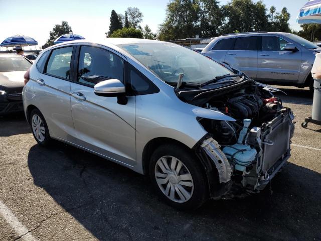 Photo 3 VIN: JHMGK5H59GX004196 - HONDA FIT LX 