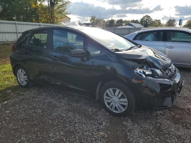 Photo 3 VIN: JHMGK5H59GX010841 - HONDA FIT LX 