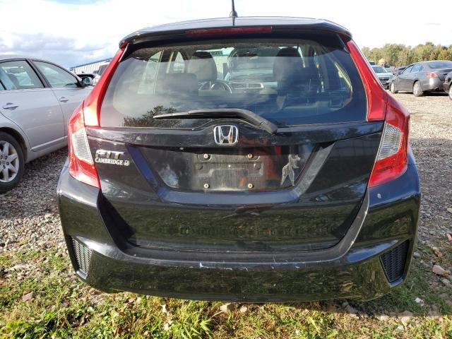 Photo 5 VIN: JHMGK5H59GX010841 - HONDA FIT LX 