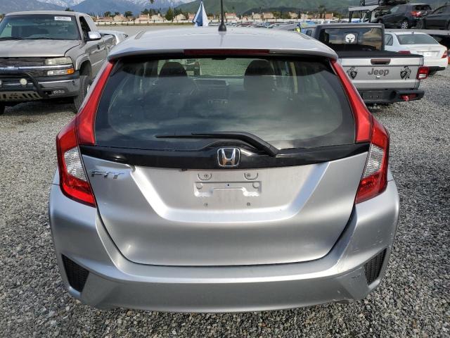 Photo 5 VIN: JHMGK5H59GX015585 - HONDA FIT LX 